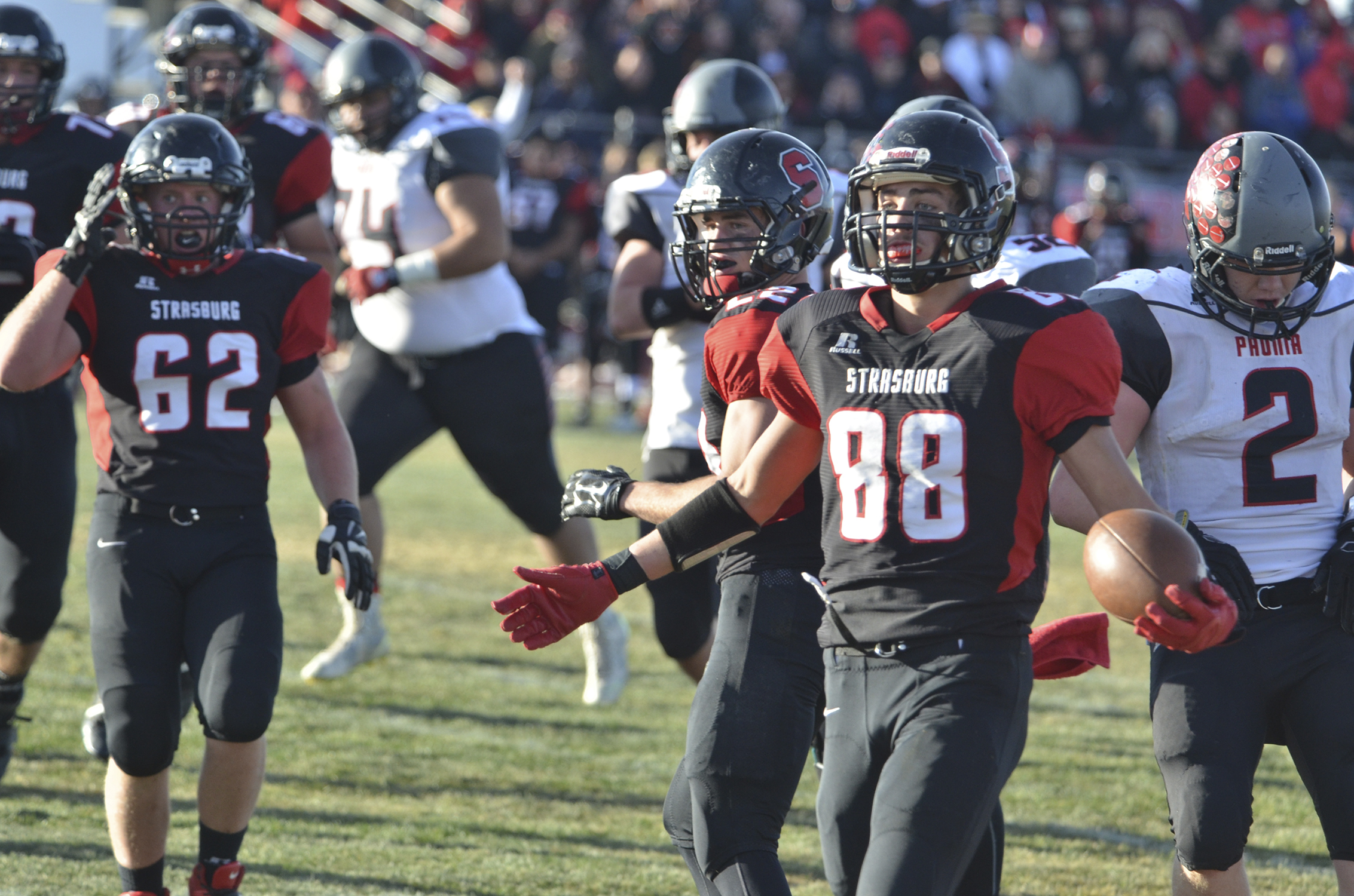 Strasburg's Chase Starman celebrates after reaching the end zone in the Indians' 49-28 victory over Paonia in the 1A football semifinals Saturday afternoon.